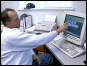 Picture of man using computer.