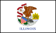 Image of the Illinois State Flag.  The Illinois flag is a simple representation of the Great Seal of Illinois against a white background. A Bald Eagle, representing the United States, holds a red streamer in its beak. On the streamer is the State Motto, 'State sovereignty, national union' which means that Illinois governs itself under the government of the United States. In the Bald Eagle's talons is a shield with thirteen bars and thirteen stars representing the original thirteen colonies. The date Illinois was admitted to the Union, 1818, and the date of the State Seal, 1868, are printed on a boulder. The ground around the boulder symbolizes the rich soil of this prairie state. In 1969, the General Assembly voted to add the word 'ILLINOIS' under the Great Seal of the flag in blue upper case letters, to ensure that people not familiar with the Great Seal of Illinois would recognize the banner. The flag was originally adopted in 1915.