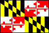 Image of the Maryland State Flag.  The Maryland State Flag is the only state flag based on heraldic emblems. The design of the flag is taken from the shield in the coat of arms of the Calvert family, the colonial proprietors of the state of Maryland. The coat of arms adopted by George Calvert, the first Lord Baltimore, included a shield that combined the yellow and black colors of his paternal family and the red and white colors of his maternal family, the Crosslands. (NOTE: There is contention that the red and white colors identified as that of the Crosslands is a misrepresentation. It is said that the colors are those of the Mynne family, the family name of Anne Calvert, wife of George Calvert.) The arms of the Calvert and Crosslands (Mynne) families are displayed in diagonally opposing quadrants of the flag. Officially whenever the state flag is flown there should be a 'cross botonee' (red and white painted metal) mounted on the top of the flagpole. The flag was adopted in 1904.