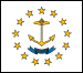 Image of the Rhode Island State Flag.  The flag displays a gold ship's anchor, recognized as a symbol of hope for centuries, centered on a white field surrounded by thirteen gold stars, representing the first thirteen states. Below the anchor is a blue ribbon that displays the word 'HOPE', the state motto. The colors and design of the flag date back to colonial times and the original establishment of Rhode Island and the Providence Plantations under King Charles II of England. The most prominent feature of the flag, the anchor, dates back to 1647 and the Cromwellian Patent of 1643 when the Providence Plantations were established. Later, when a more liberal charter was bestowed upon the colony, the anchor was again chosen for the seal and the word 'HOPE' was added. The colors, white and blue, were flown during the American Revolution, the War of 1812 and the Mexican War. The thirteen stars representing the original thirteen colonies were also displayed on flags flown by the Continental Regiments during the Revolution. The flag was adopted in 1897.