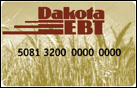 Image of South Dakota EBT Card, with red Dakota EBT logo on background of golden wheat.